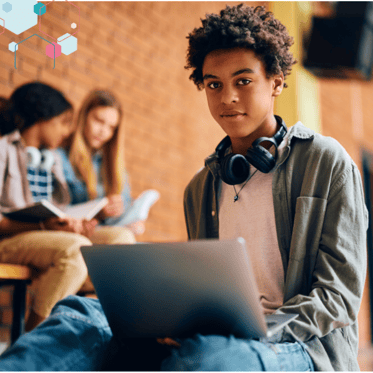 College student looking up for a laptop computer