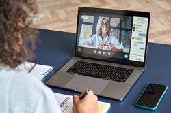 woman on a video conference laptop call