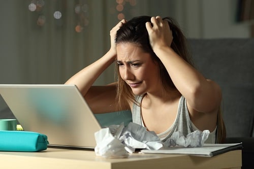 Upset Student at Laptop